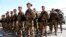 FILE - Italian soldiers with the NATO-led International Security Assistance Force (ISAF) at Camp Arena, Herat Airport, west of Kabul, Afghanistan, Sept, 10, 2013. 