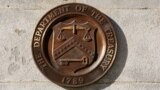 (FILE) A bronze seal for the Department of the Treasury is shown at the U.S. Treasury building in Washington, U.S., January 20, 2023. 