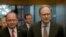 FILE - Romanian Foreign Minister Bogdan Aurescu, left, walks with NATO Deputy Secretary-General Alexander Vershbow in Bucharest, Romania, Oct. 15, 2015.