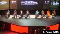 Presidential candidates take turn answering a series of questions on foreign policy and internal security during the debate in Kampala, Uganda, Feb. 13, 2016. 