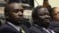 Zimbabwe Vice President Joice Mujuru (R), Prime Minister Morgan Tsvangirai (C) and member of the House of Assembly of Zimbabwe for Kuwadzana, Nelson Chamisa, attend the presentation of the Final Draft of the Constitution for debate in Parliament Building 