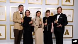 Director/producer Chloe Zhao, winner of the awards for Best Picture and Best Director for 'Nomadland,' poses in the press room at the Oscars on April 25, 2021, at Union Station in Los Angeles. 