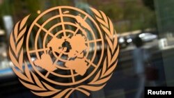 FILE - The logo of the United Nations is seen on the outside of their headquarters in New York, September 15, 2013. 