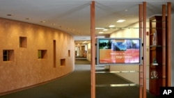 FILE - The entrance to the main building on the Fargo, N.D., campus of Microsoft is painted in colors to resemble the grains grown in North Dakota.