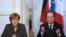 Nemačka kancelarka Angela Merkel i francuski predsednik Fransoa Oland na zajedničkoj pres konferenciji u Parizu, 19. februara 2014. 
