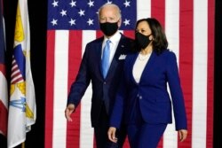 FILE - Democratic presidential candidate former Vice President Joe Biden and his running mate Senator Kamala Harris, D-Calif., August 12, 2020.
