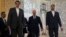 U.N. Special Envoy for Syria, Staffan de Mistura, center, arrives for a meeting with Iranian Foreign Minister Mohammad Javad Zarif, as he is accompanied by deputy Foreign Minister, Hossein Amir Abdollahian, right, in Tehran, Iran, Jan 10, 2016.