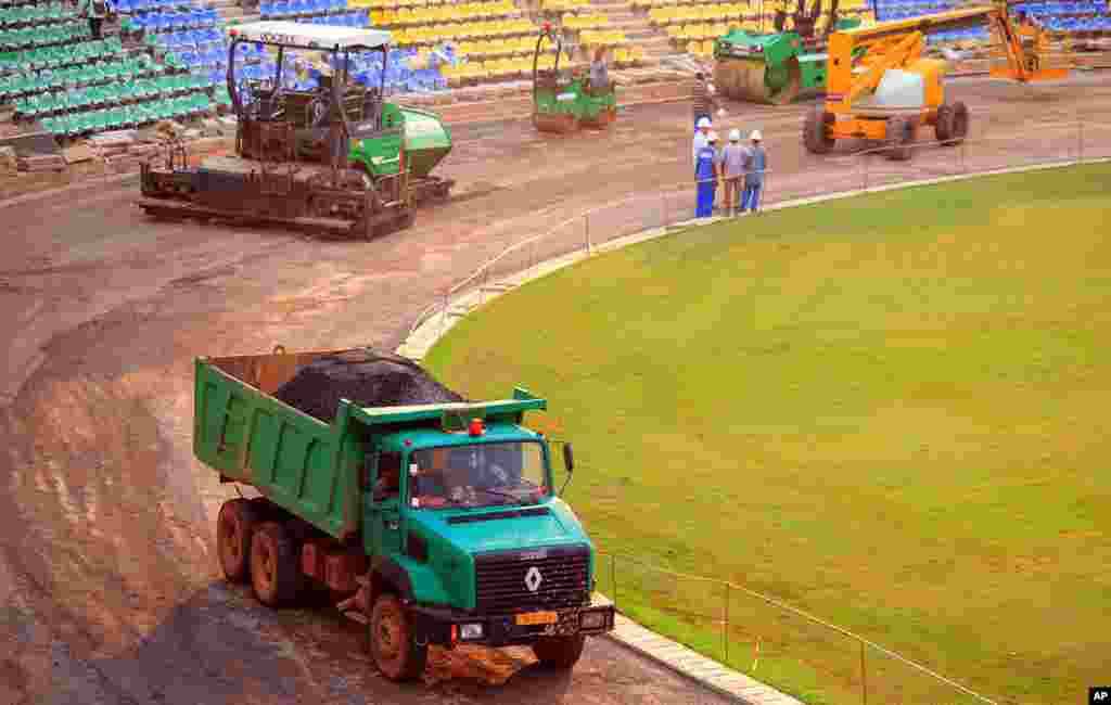 Trucks and heavy equipment at the site of the Franceville stadium under construction (Gabon Local Organizing Committee)