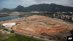 FILE - Olympic Park, that will host competitions for 10 sports at Rio's Olympics in 2016, is under construction in the area previously occupied by the Jacarepagua Autodrome in Rio de Janeiro, Brazil. 