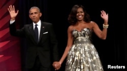 U.S. President Barack Obama and first lady Michelle Obama arrive at the Congressional Black Caucus Foundation's 46th annual Legislative Conference Phoenix Awards Dinner in Washington, Sept. 17, 2016.