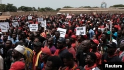 Des manifestants contre un accord de défense controversé conclu avec les Etats-Unis à Accra, Ghana, 28 mars 20148.