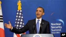 President Barack Obama speaks during a news conference with South Korean President Lee Myung-bak at the Blue House, the official presidential house, in Seoul, South Korea, Sunday, March 25, 2012. 