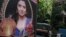Indian policemen guard near a picture of Indian actress Sridevi displayed outside her residence in Mumbai, India, Feb. 27, 2018.