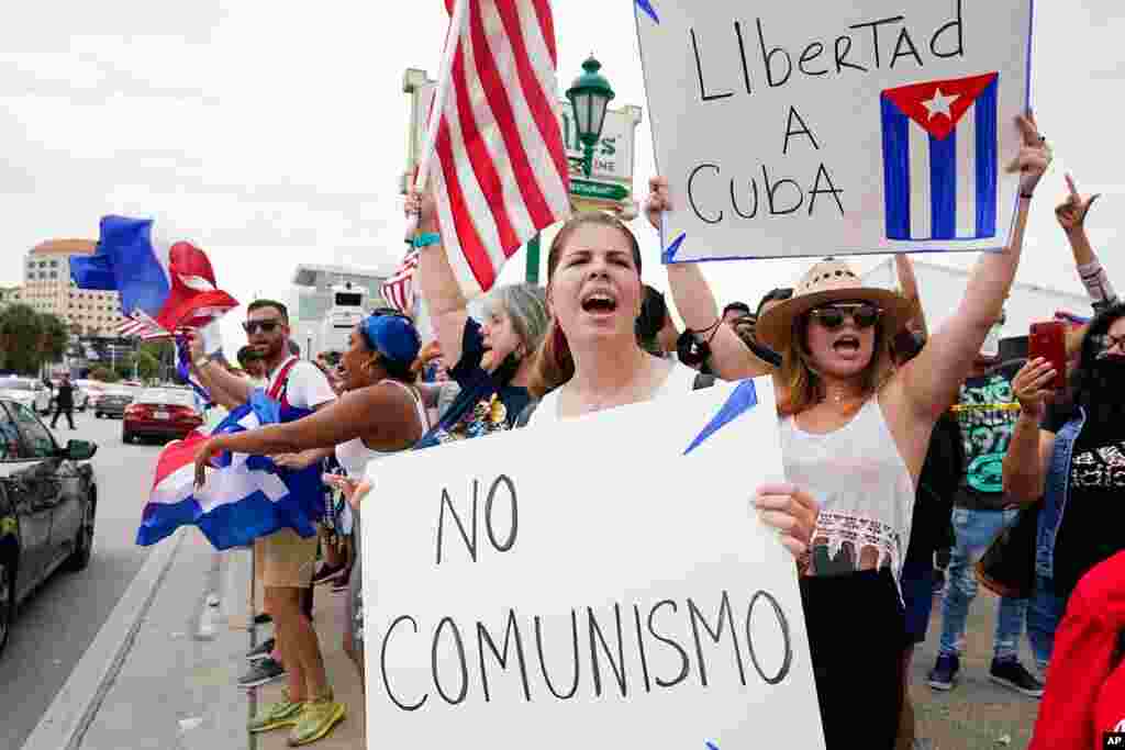 Cuban exiles rally at Versailles Restaurant in Miami&#39;s Little Havana neighborhood in support of protesters in Cuba, July 12, 2021, in Miami. 