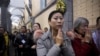 FILE - Chinese Christians attend Christmas Eve Mass at a Catholic church in Beijing, Dec. 24, 2016.