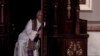 FILE - A priest hears a confession at the Metropolitan Cathedral in San Jose, Costa Rica, June 02, 2019. 