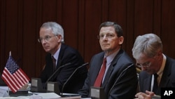 U.S. special envoy for Afghanistan and Pakistan Marc Grossman (C), U.S. Ambassador to Pakistan Cameron Munter (L), and U.S. Ambassador to Afghanistan Ryan Crocker attend a tripartite meeting of Pakistani, U.S. and Afghan officials at the foreign ministry 