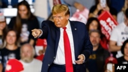 FILE - Former U.S. president and 2024 presidential hopeful Donald Trump attends a "Get Out the Vote" Rally in Conway, South Carolina, on Feb. 10, 2024.