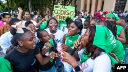 Women shout slogans during a protest in front of the the Dominican Parliament in Santo Domingo on July 17, 2024.