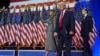 Republican presidential nominee former President Donald Trump, Melania Trump and Barron Trump, arrive to speaks at an election night watch party, Nov. 6, 2024, in West Palm Beach, Fla.