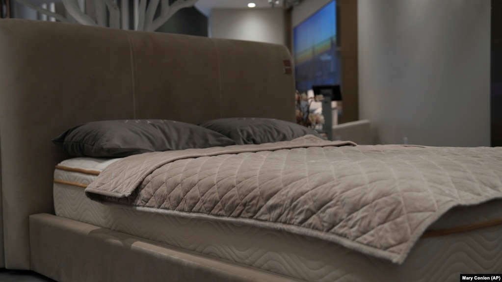 Weighted blankets are on display in a mattress sales showroom in New York City, New York, Dec. 4, 2024. (AP Photo/Mary Conlon)