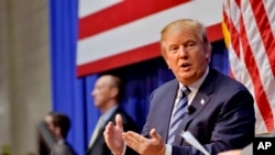 Republican presidential candidate Donald Trump speaks during a town hall meeting at the Ben Johnson Arena on the Wofford College campus, Nov. 20, 2015, in Spartanburg, S.C.