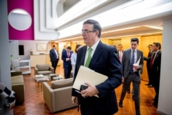 Mexican Foreign Affairs Secretary Marcelo Ebrard arrives for a news conference at the Mexican Embassy in Washington, Tuesday, June 4, 2019, as part of a Mexican delegation in Washington for talks.