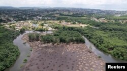 FILE - An aerial view shows a mangrove field that has been cleared to make space for new constructions, in the Mindoube 1 neighborhood, in Libreville, Gabon October 17, 2021. 