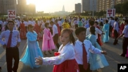 Pro-European integration protesters form the Ukranian word "Lustration" at Independence Square in Kyiv.