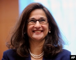 FILE - Nemat Shafik recently became the new president of Columbia University in New York City. This photo is from 2011 during her time at the International Monetary Fund. (AP Photo/Geert Vanden Wijngaert. File)