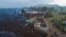 La lave de l'éruption du mont Nyiragongo traverse Buhene au nord de Goma, au Congo lundi 24 mai 2021.