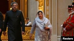 Pakistan's Prime Minister Shahid Khaqan Abbasi arrives to attend The Queen's Dinner during The Commonwealth Heads of Government Meeting at Buckingham Palace in London, April 19, 2018.