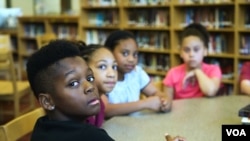 Students at George P. Phenix School in Hampton, Virginia, discuss slavery and race relations with the school principal.