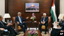 U.S. Secretary of State John Kerry, center left, meets with Palestinian President Mahmoud Abbas, center right, on Friday, July 19, 2013 in the West Bank city of Ramallah.