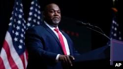 FILE - North Carolina Lieutenant Governor Mark Robinson speaks before Republican presidential nominee former President Donald Trump at a campaign rally in Asheville, North Carolina, Aug. 14, 2024.