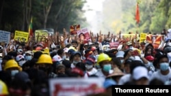 Demonstrators protest against military coup in Yangon, Feb. 22, 2021.