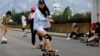 Chinese Women Turn to Skateboarding to Lower COVID Tension
