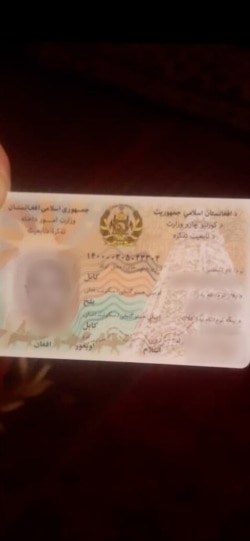 There are two types of national identification cards in Afghanistan. This is a recent one that states the ethnicity of Uyghurs as “Uyghur.” (Abdulaziz Naseri)