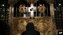 FILE - A man prays at a mosque in Cairo, Egypt, Jan. 2, 2015. 