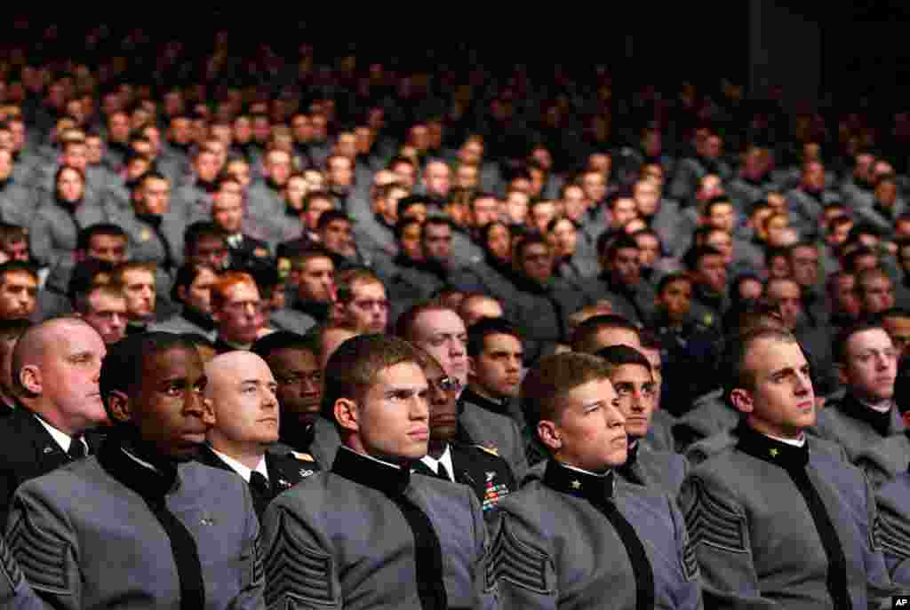 U.S. Army cadets watch President Obama announce his strategy at the U.S. Military Academy in West Point, New York, December 1, 2009.