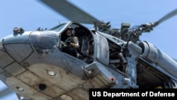 U.S. Navy MH-60 Sea Hawk helicopters are supporting Project Freedom in and near the Strait of Hormuz. 