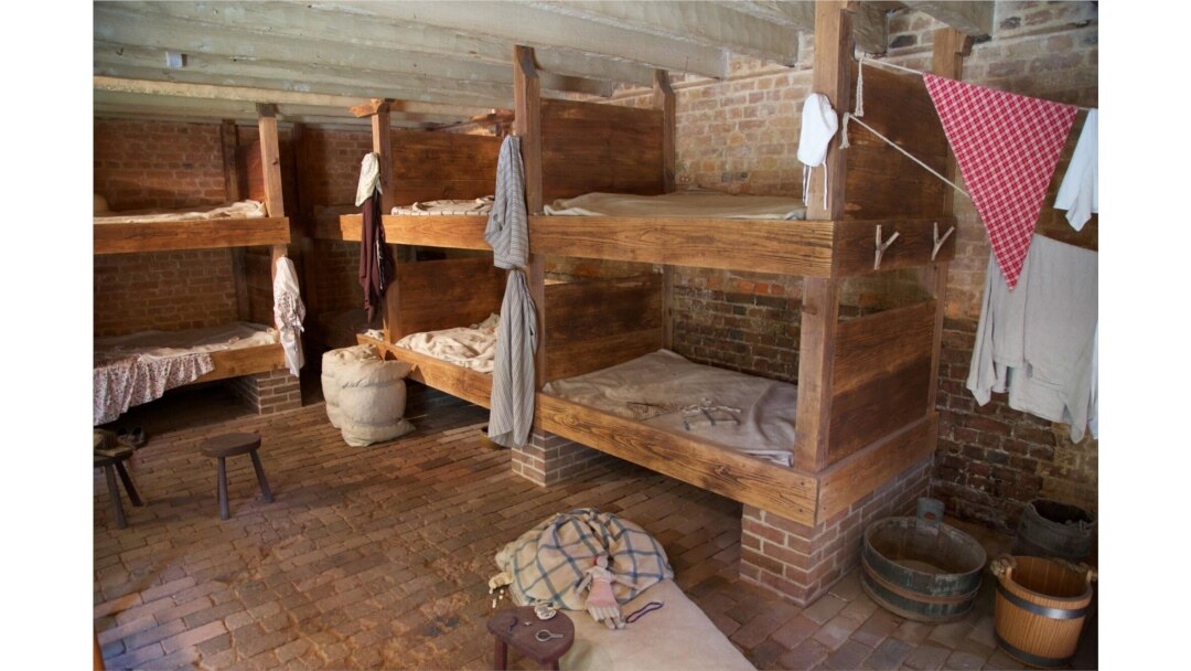 Reconstruction of the men's bunkroom in the greenhouse slave quarters at Mount Vernon in Alexandria, Virginia. (Courtesy George Washington's Mount Vernon)
