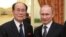 FILE - In this Feb. 7, 2014, photo, Russian President Vladimir Putin, right, shakes hands with president of the Presidium of North Korea's Supreme People's Assembly Kim Yong Nam at the Olympic reception hosted by the Russian President in Sochi, Russia.