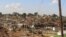 According to the National Tuberculosis, Leprosy and Lung Disease Program in Kenya, the major factor responsible for the large TB disease burden in Kenya is the concurrent HIV epidemic. Contributing factors include poverty and social deprivation leading to mushrooming of slums adjacent to cities, such as Nairobi's Kibera Slum pictured above. (R. Ombuor for VOA)