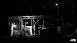 Security forces and bomb disposal units are deployed to the scene of a bus explosion in Bat Yam, Israel, on Feb. 20, 2025. 