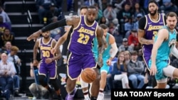 FILE - Superstar LeBron James (23) other NBA players planned to begin limited workouts at team facilities, May 8, 2020.