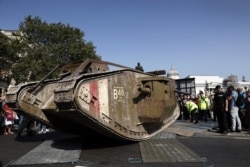 FILE - A replica British Mark IV tank is prepared before being driven around Trafalgar Square in central London, Sept. 15, 2016, during a photocall to mark 100 years since they were first used in action during World War I.