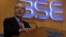 FILE - William C. Dudley, President and Chief Executive Officer of the Federal Reserve Bank of New York addresses Indian businessmen at the Bombay Stock Exchange (BSE) Mumbai, India, May 11, 2017.