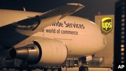 A cargo plane parks at the UPS distribution center at the International Cargo Airport in Cologne, western Germany, 01 Nov 2010