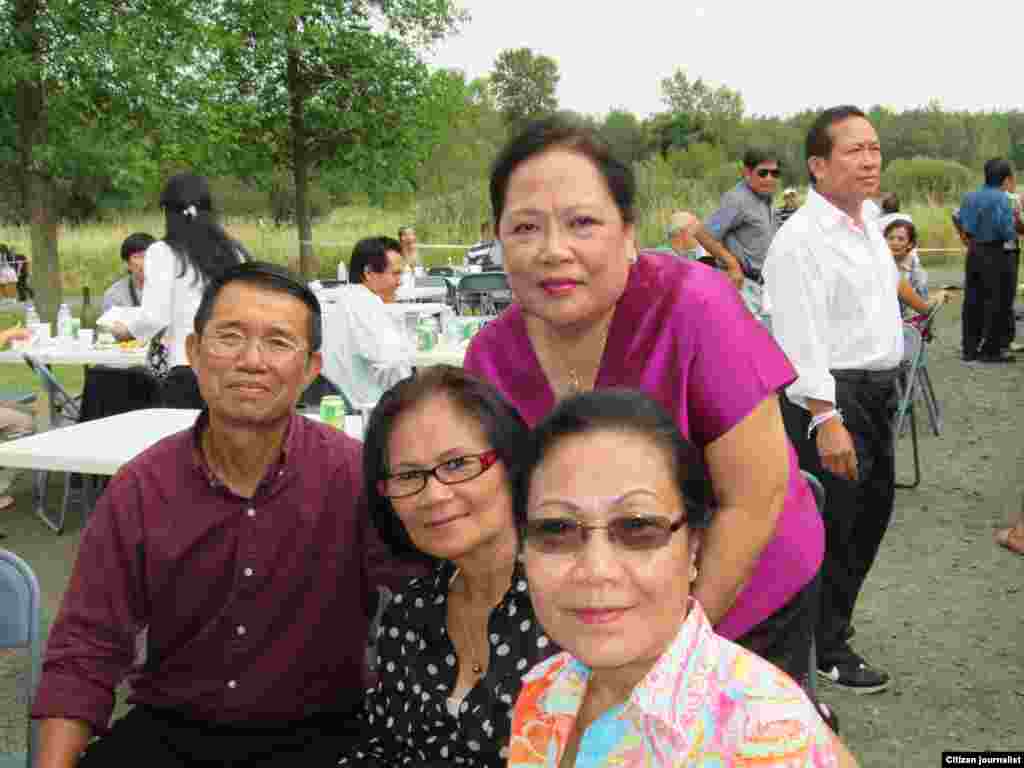 Acrane in front of the sun as a sandstorm engulfs Kuwait City.